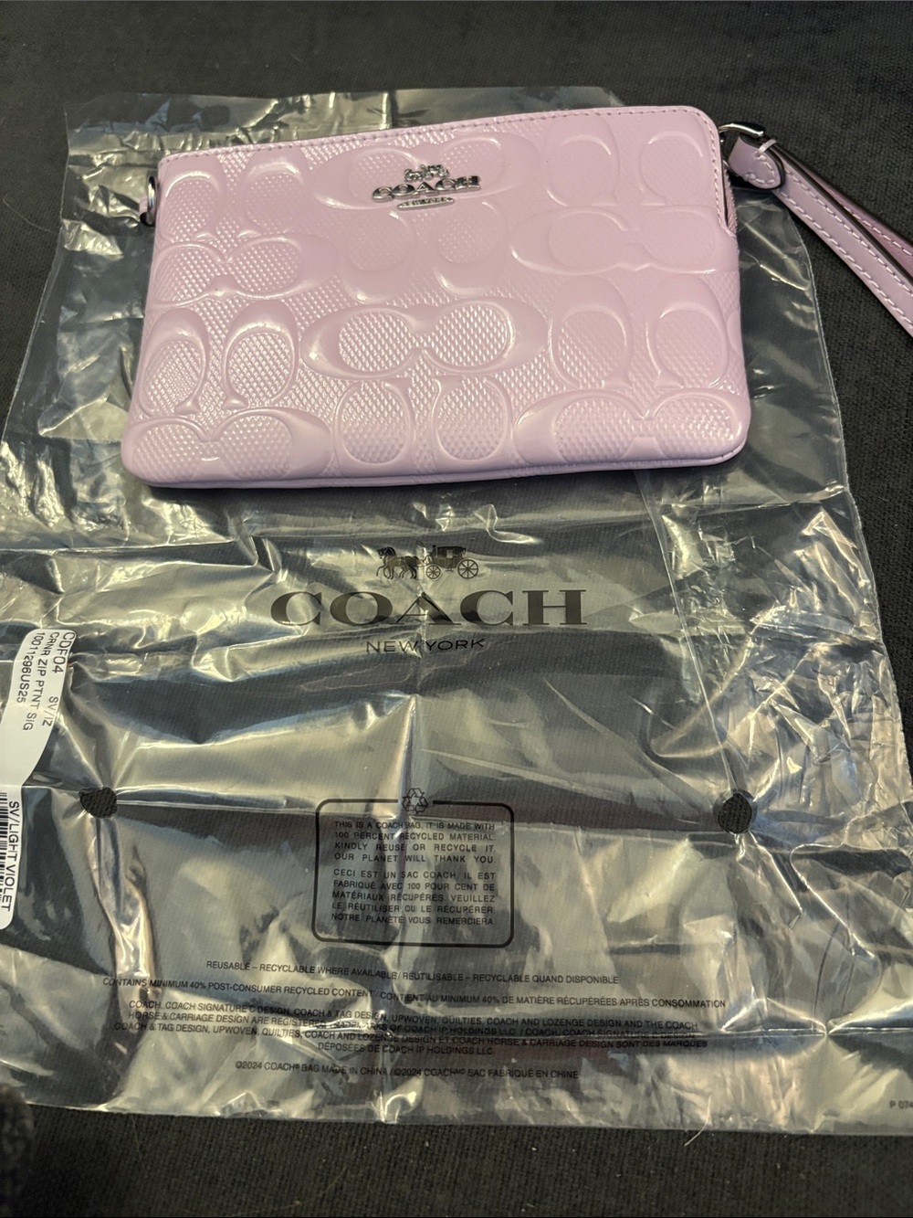 COACH Light Lilac Embossed Signature Wristlet